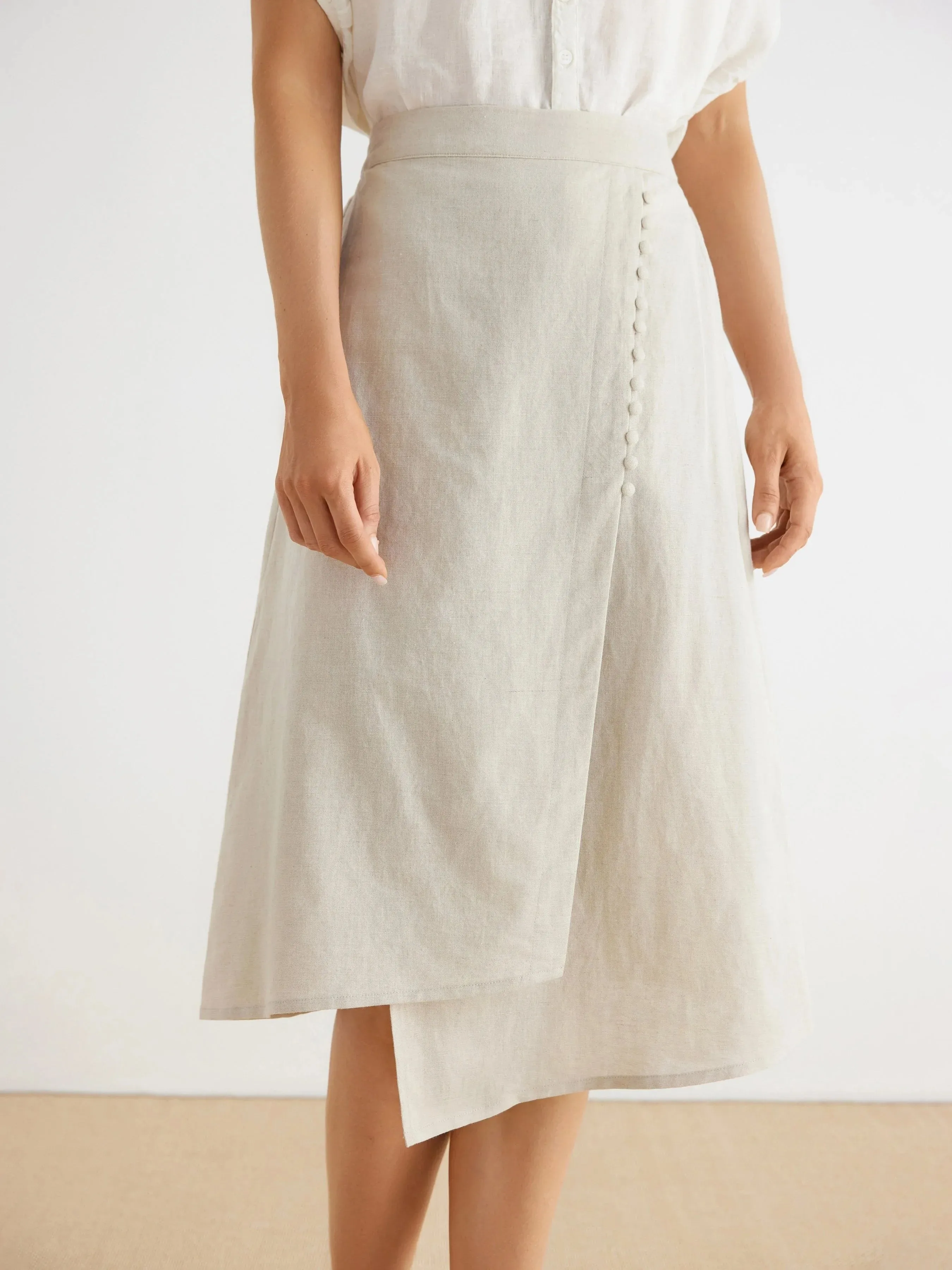 Charlie Linen Asymmetrical Hem Pockets Midi Skirt