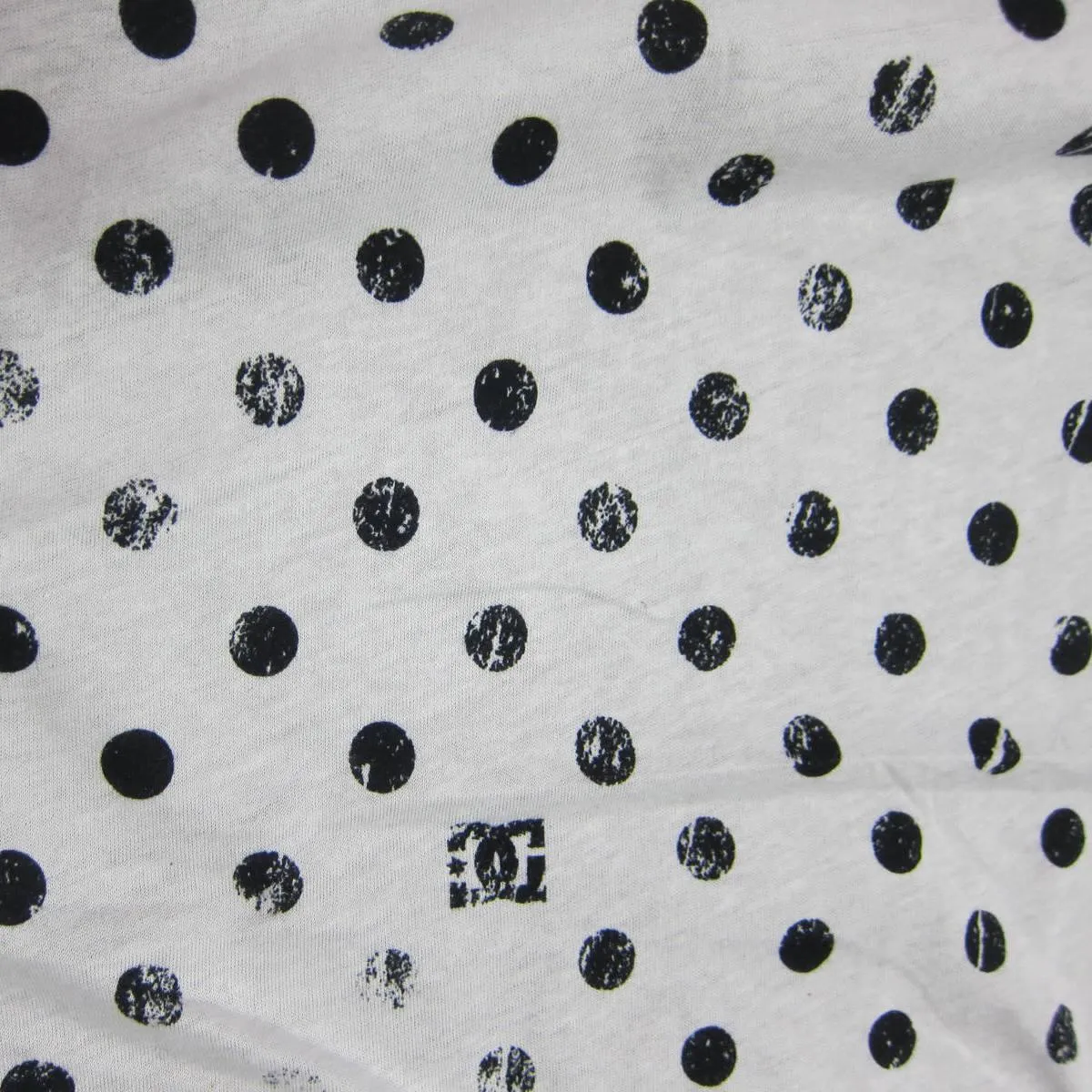 Distressed Black Dots on White Cotton/Poly Jersey Fabric