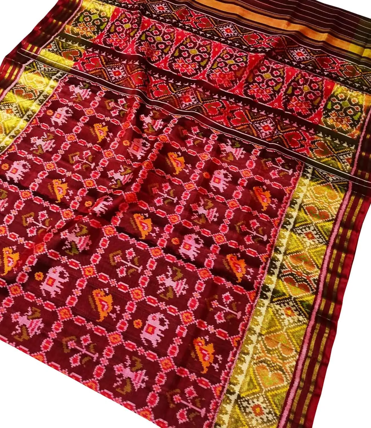 Elegant Maroon Patola Handloom Silk Saree: A Timeless Classic