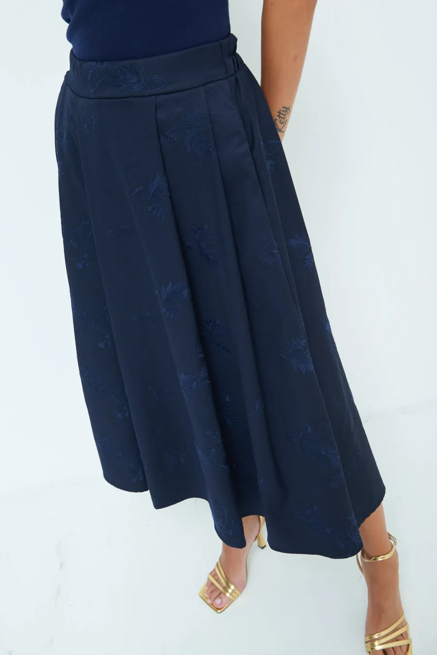 High-waisted flared midi skirt wholesale